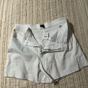 White denim jeans with tags. Size 30.